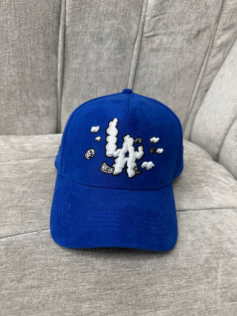31 Hats Blue Clouds