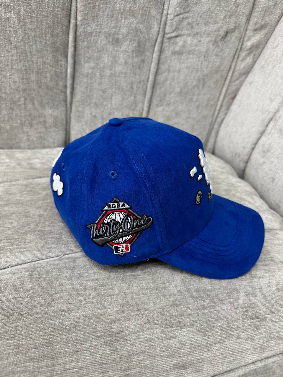 31 Hats Blue Clouds